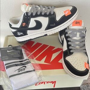 Nike Stussy Black and White Low-Top Sneakers